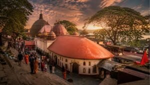 Kamakhya Devi Temple in Guwahati, Assam during sunrise, showcasing the sacred Shakti Peetha known for the Yoni Peetha, Ambubachi Mela, and Tantric worship traditions.