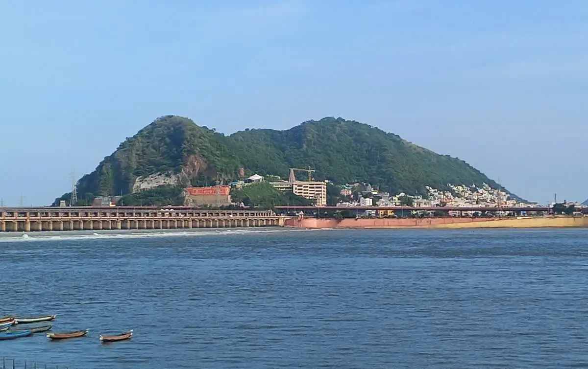 Indrakeeladri hill rising above the Krishna river and Prakasam Barrage in Vijayawada
