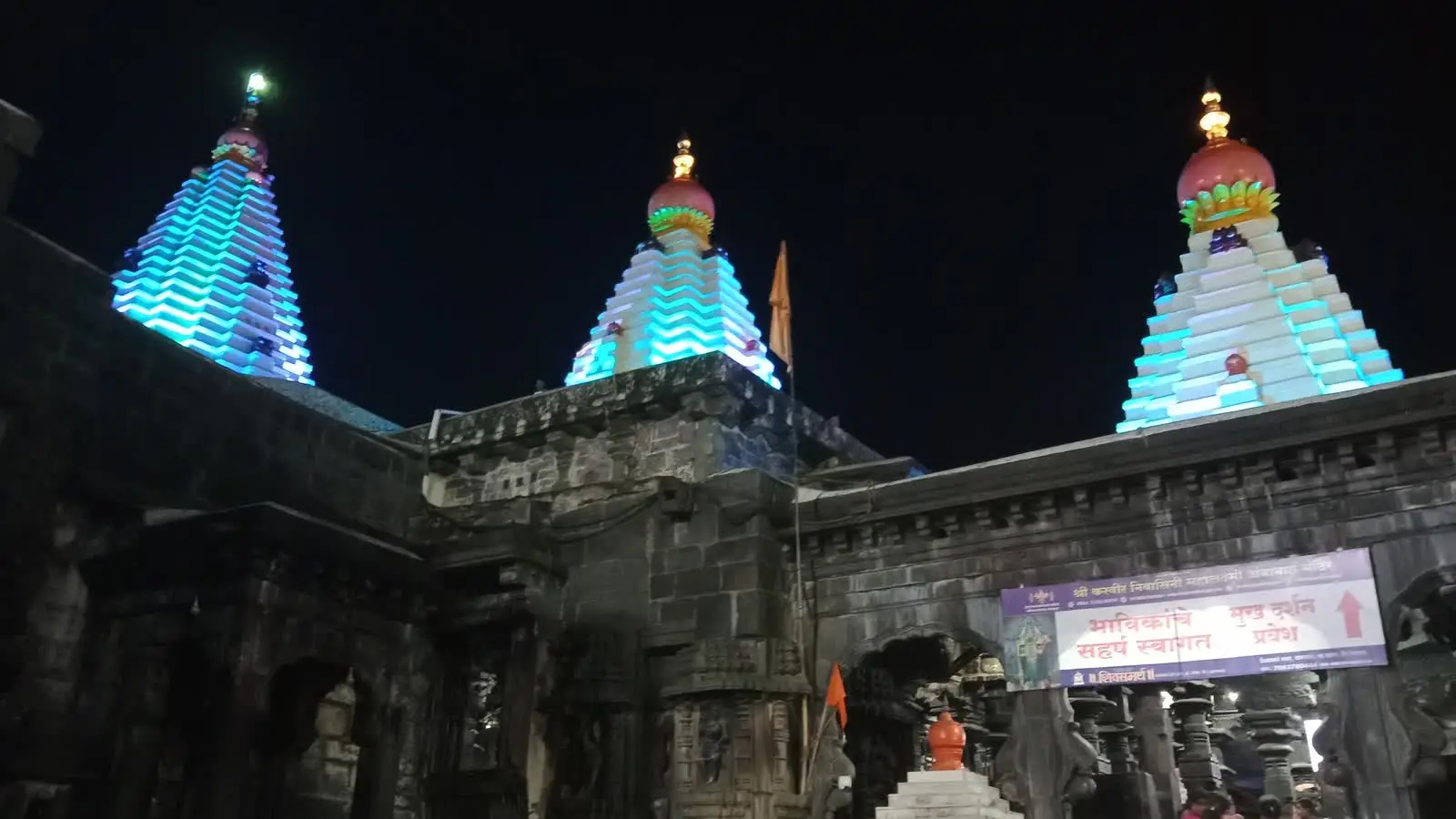 The Mahalakshmi Ambabai temple shikharas in Kolhapur lit up at night
