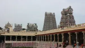 West and north gopurams of Meenakshi Amman temple above the Golden Lotus tank, Madurai