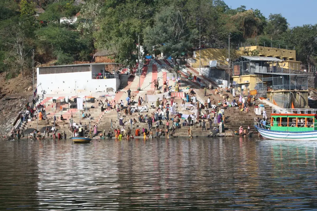 Pilgrims bathing at Patalganga ghat on the Krishna river below Srisailam